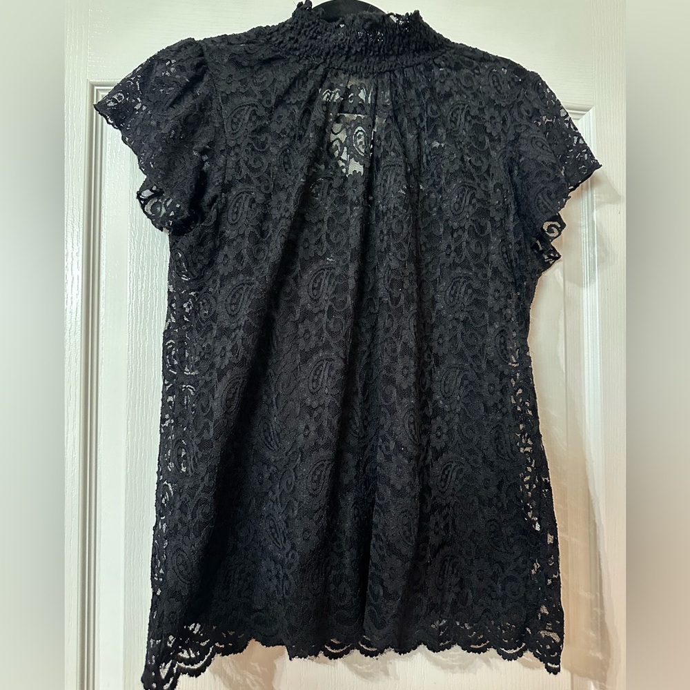Black lace Shirt with undershirt attached underneath .